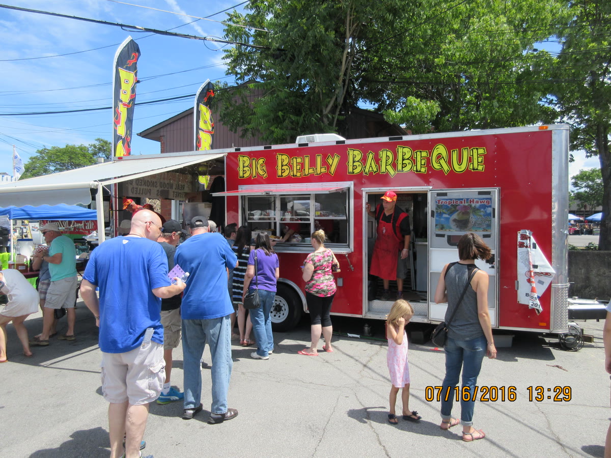 Big Belly BBQ catering spread at an event
