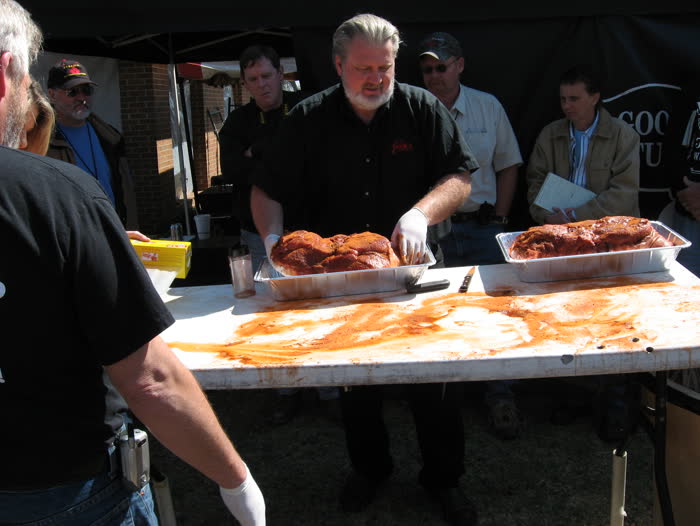 Team preparing smoked meats