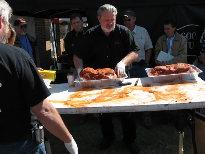 Big Belly BBQ team preparing smoked meats